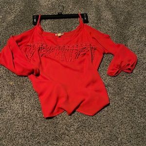 Cute burnt orange top.